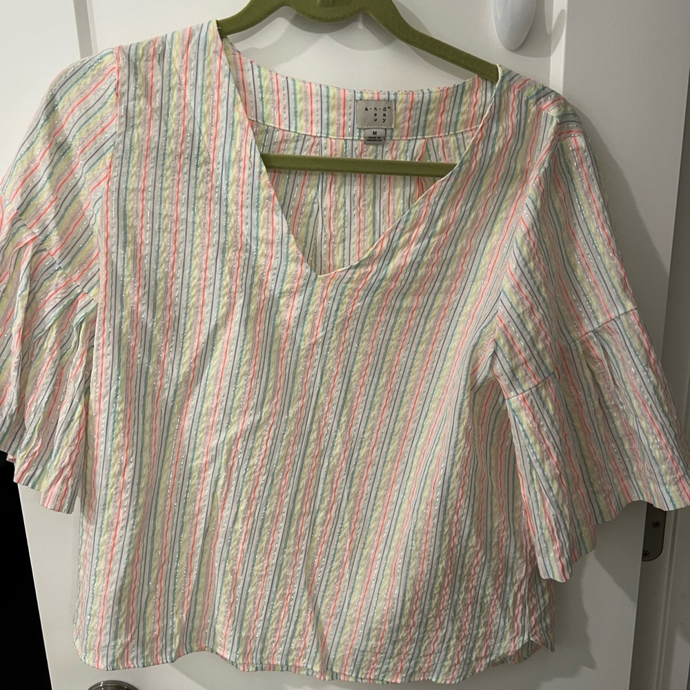 Colored and crinkled metallic shirt